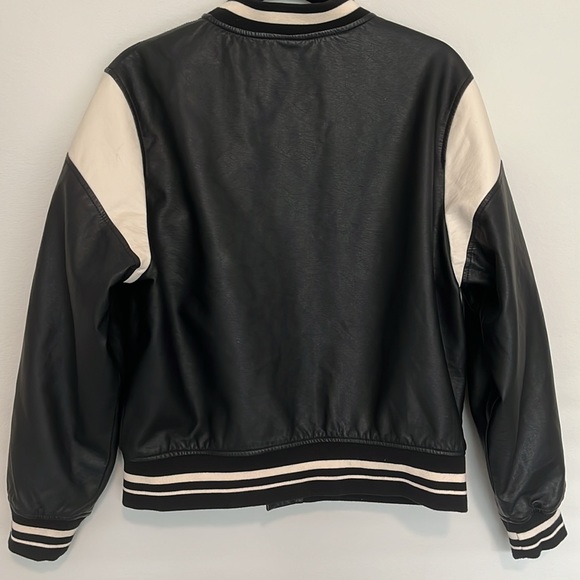 Zara jersey jacket, in a black and tan color. The size is a 13-14 (size small). - Picture 7 of 7